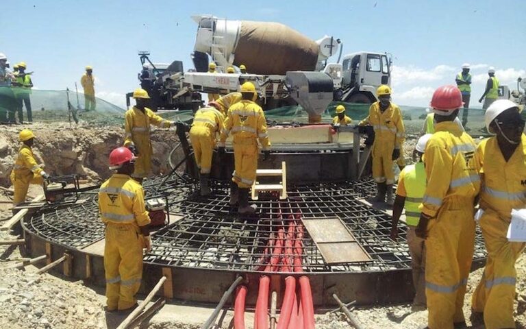 construction workers commencing building on site